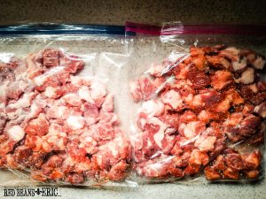 Two bags of rub covered pork cubes