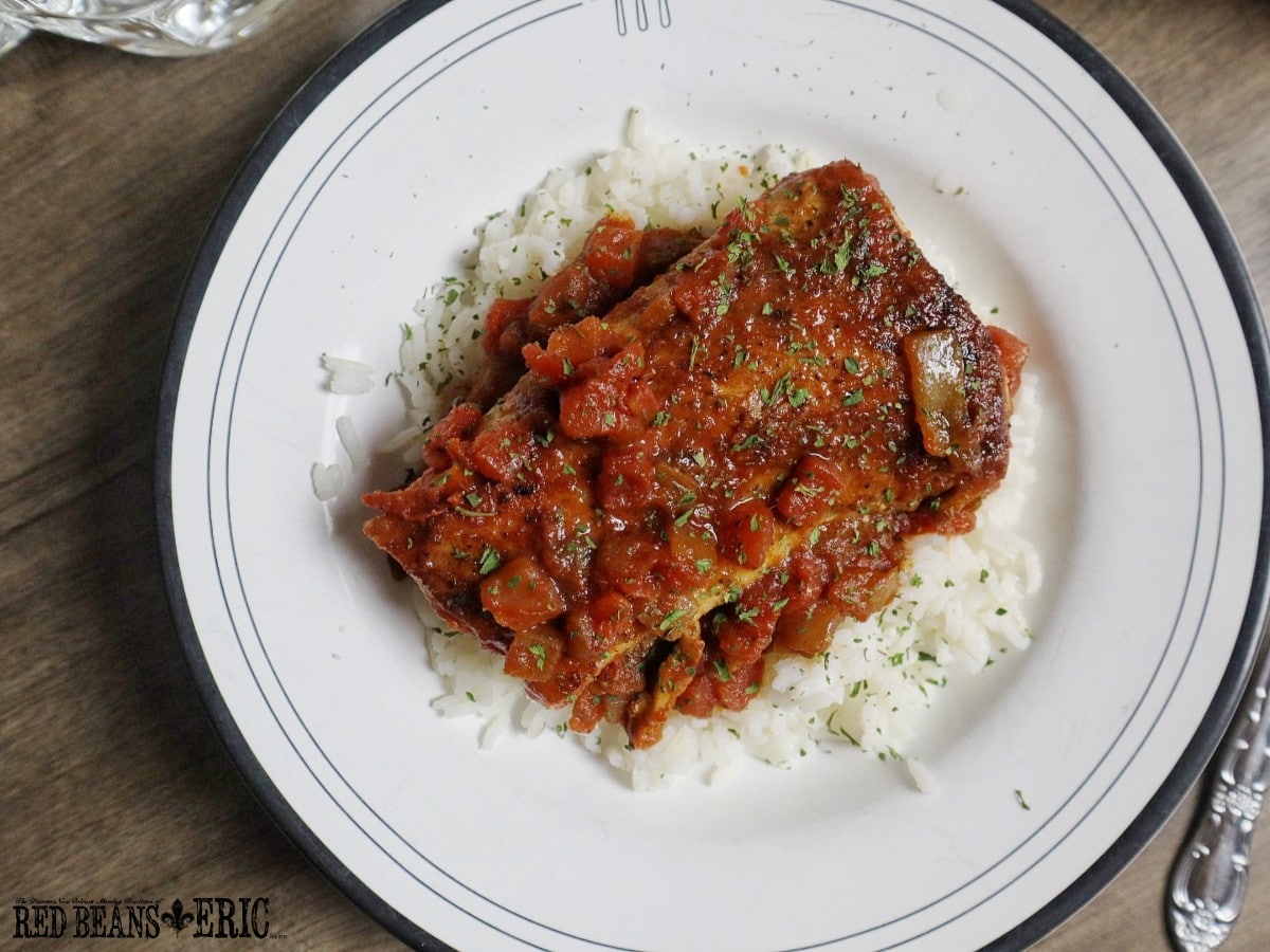 Pan fried Mahi Mahi in a Creole Sauce served over hot cooked white rice by Red Beans and Eric!