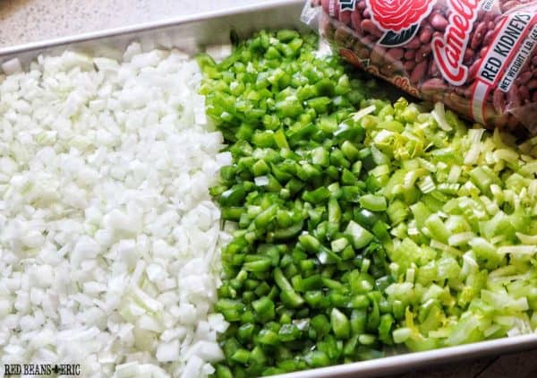 The Holy Trinity of Creole and Cajun cooking: diced onions, green bell peppers, and celery. There's also a bag of Camellia brand red beans.