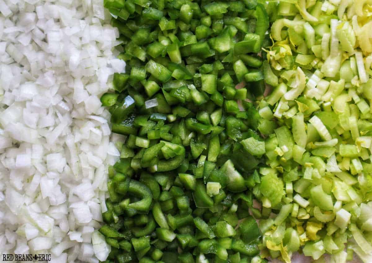 The Holy Trinity of Creole and Cajun cooking: diced onions, green bell peppers, and celery